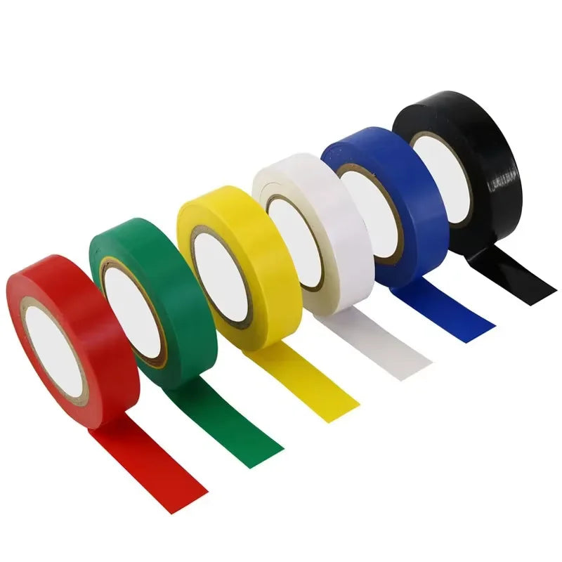 Set of colorful tapes in red, green, yellow, white, blue, and black on a white background.
