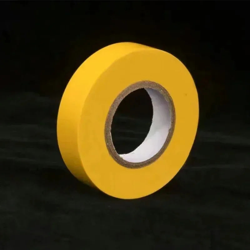 Yellow tape roll on a black background